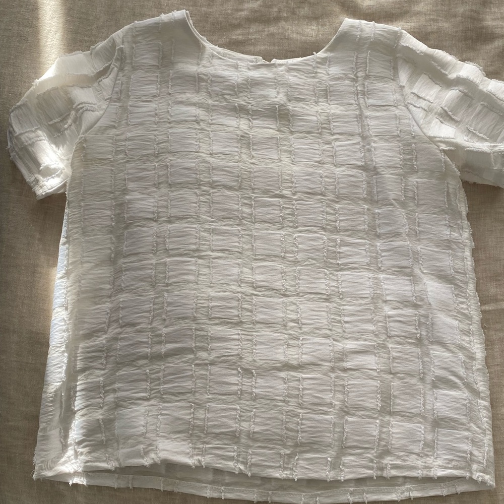White satiny top with square print